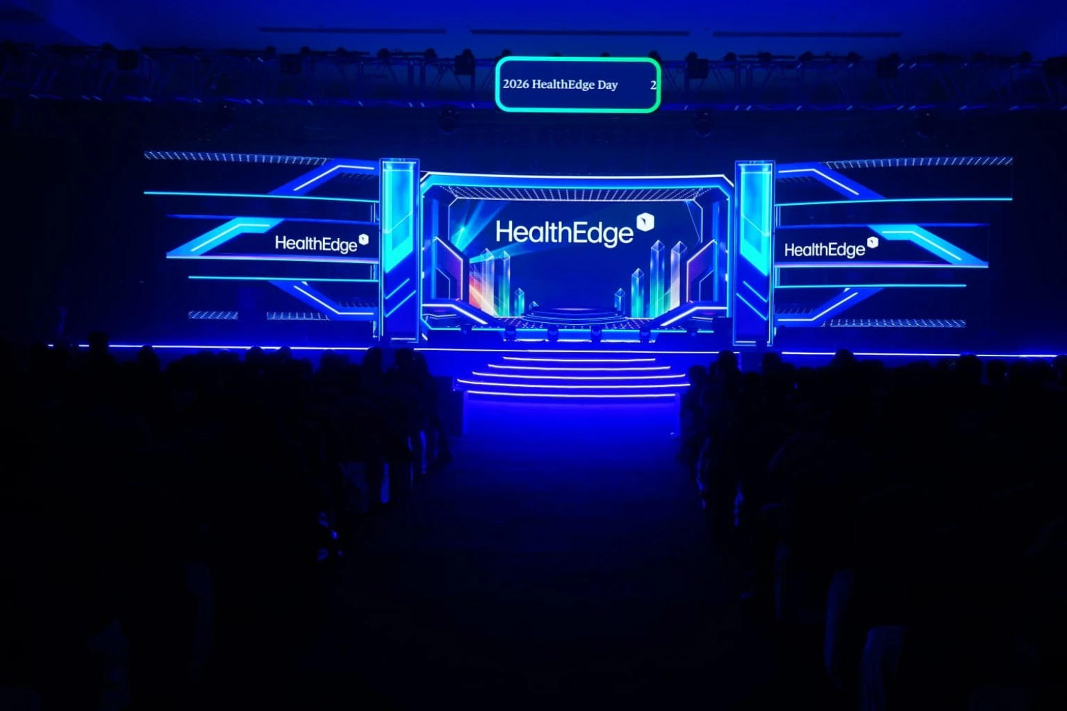 HealthEdge Day 2026 stage with blue dimensional LED graphics
